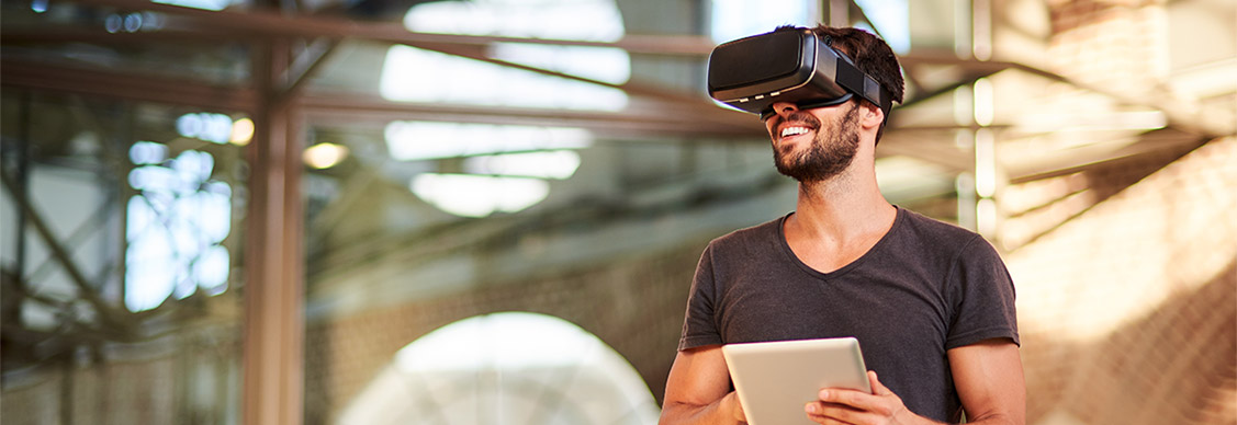 Man using virtual reality simulator headset