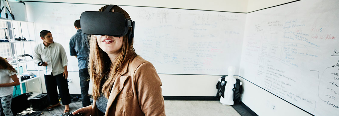 Female engineer using virtual reality headset