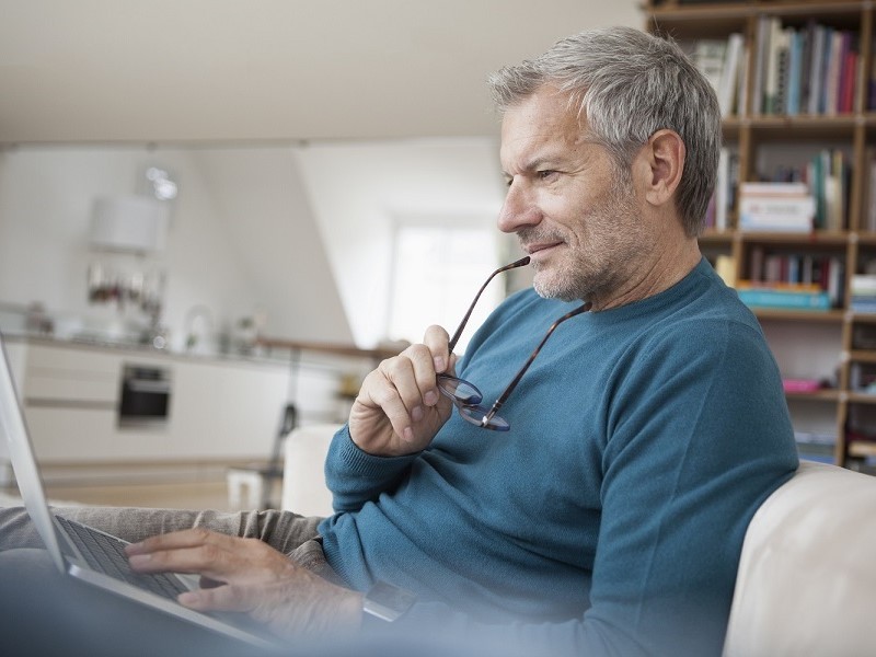 Man is working on laptop