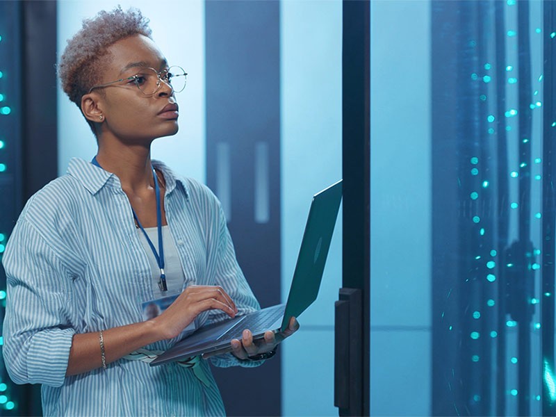 Woman working in data center