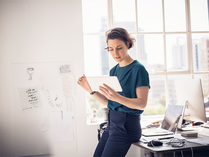 Business women working with tablet and laptop in the office