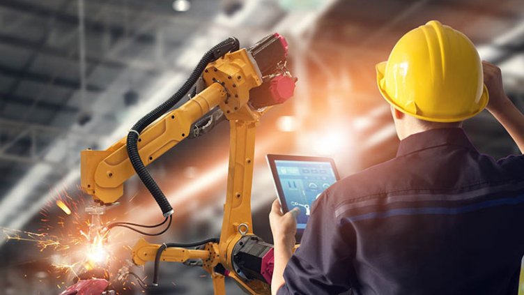 A man with tablet in construction site