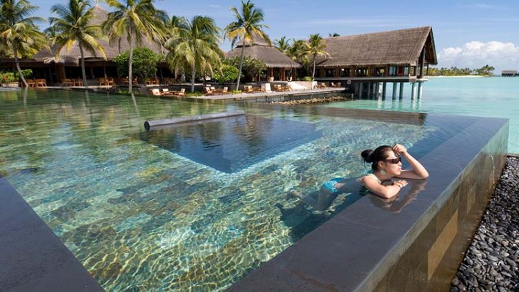 A girl swimming in the pool