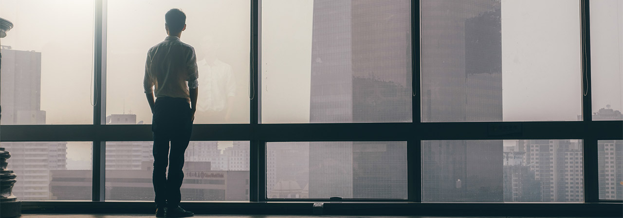 Man standing in office building