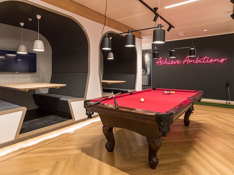 JLL sports studio with a pool table